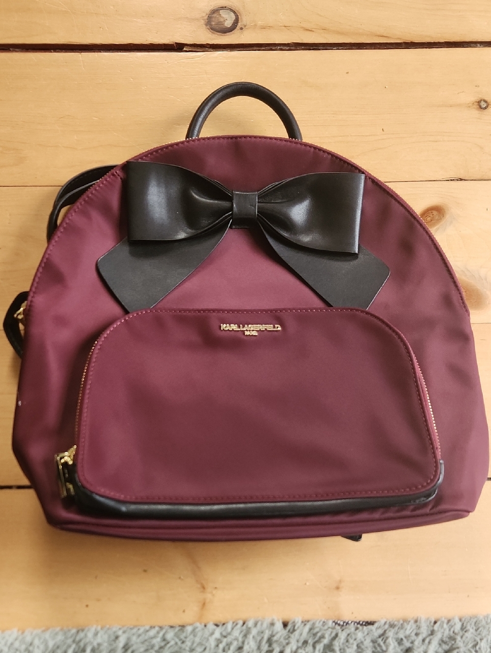 Karl Lagerfeld Burgundy Backpack with Black Bow Accent